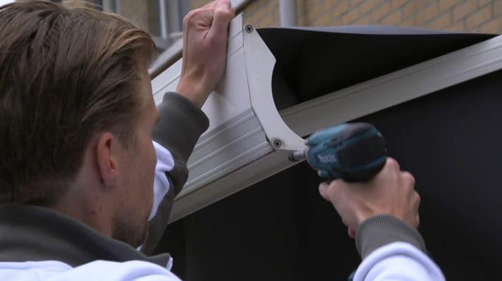 Zonnescherm doek vervangen