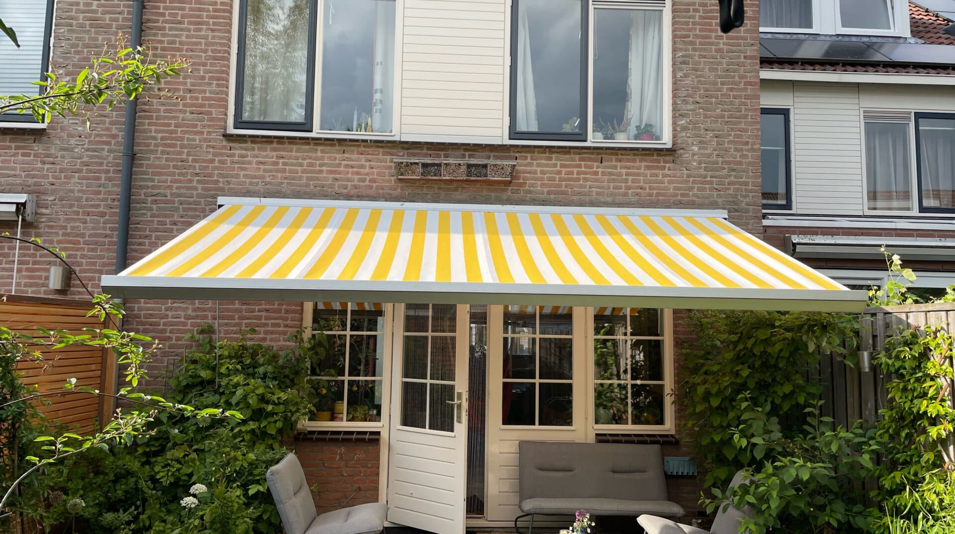 Geel met wit zonweringdoek Tibelly