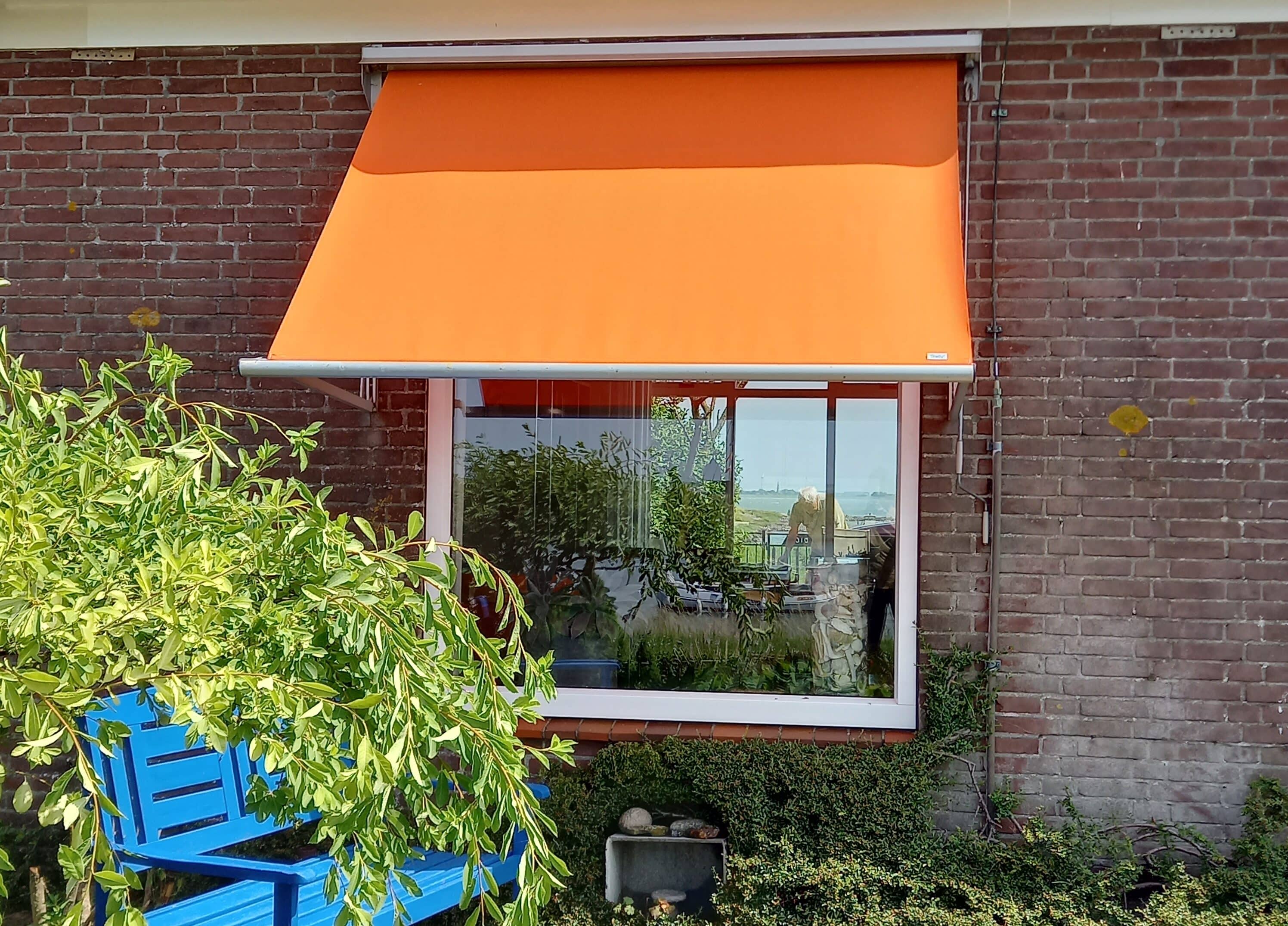 Oranje zonnescherm doek Tibelly